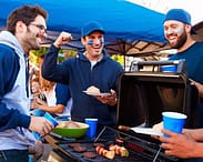 group-of-football-men-having-a-tailgate-party-with-bbq